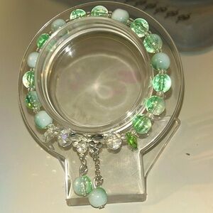 Green and white butterfly charm bracelet